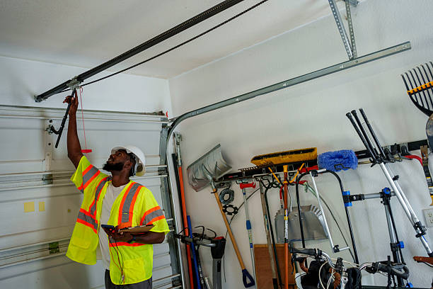 Professional Garage Door Panel Replacement technician working in Cedar County County, IA